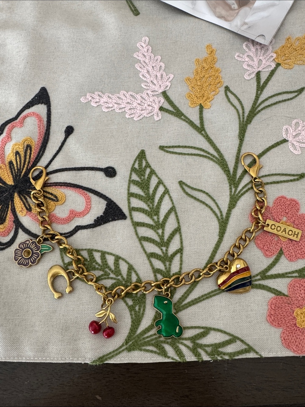Gold-Tone Charm Bracelet with Green Frog and Red Cherry Charms